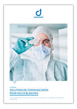 Cleanroom Intercom Systems Person in a cleanroom suit, safety glasses, and face mask.