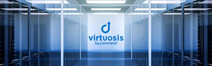 Virtuosis by Commend in Data Centre Virtuosis by Commend logo in a blue-lit data centre with server racks and a central aisle.